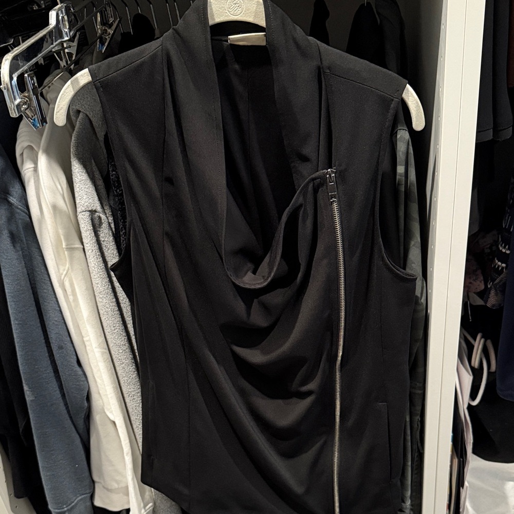 Black zipper vest.